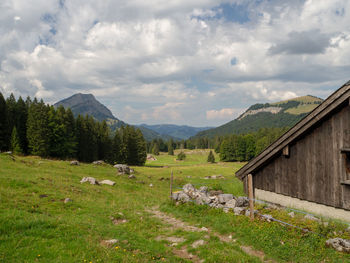 Scenic view of landscape and mountains against sky