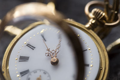 Close-up of pocket watch