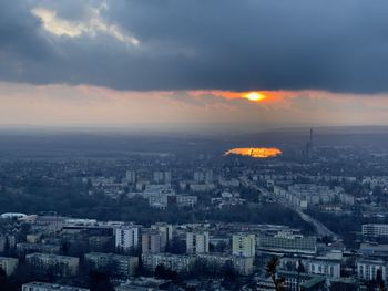 High angle view of townscape against sky during sunset