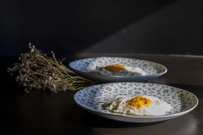 Close-up of breakfast served on table