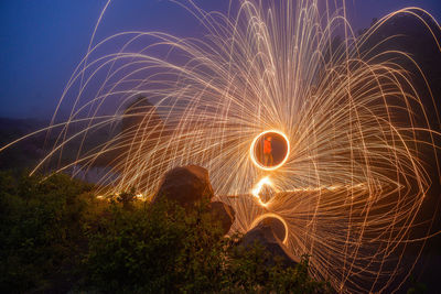 Firework display at night