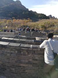 Rear view of people looking at town square