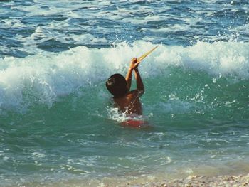 Man surfing in sea