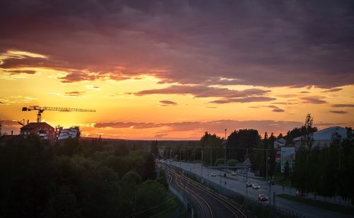 High angle view of train against sky during sunset