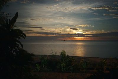 Scenic view of sea at sunset