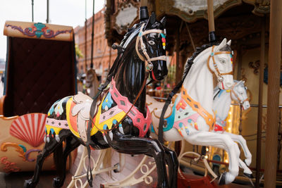 Retro style horses at amusement fair
