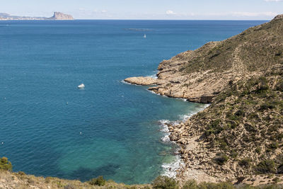 High angle view of sea shore against sky