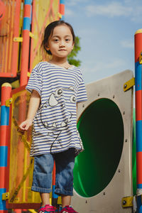 Little girl playing at the playground.