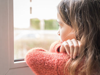 Close-up of woman looking away