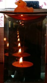 Close-up of burning candle