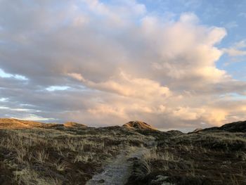 Scenic view of landscape against sky during sunset
