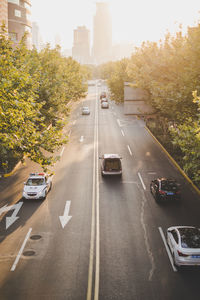 Cars on road in city