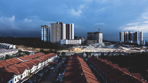 Modern buildings in city against sky