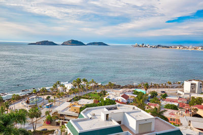 High angle view of town by sea