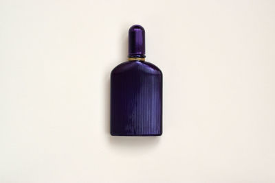 Directly above shot of glass bottle on white background