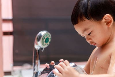 Close-up portrait of boy playing