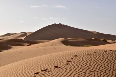 Scenic view of desert against sky