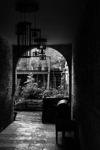 Empty alley along buildings