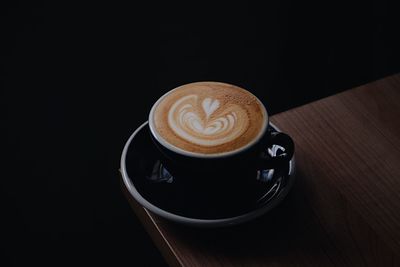 Close-up of cappuccino on table