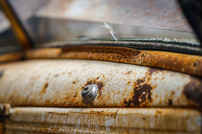 Close-up of old rusty car