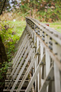 Close-up of wooden railing