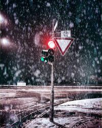 Road signs in winter at night
