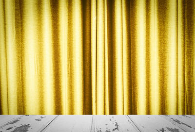 Gold colored curtain of stage theater