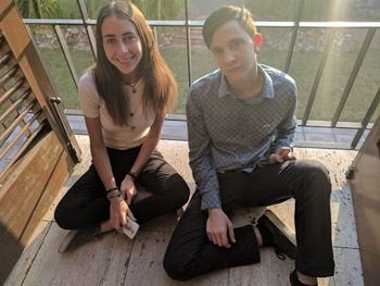 High angle portrait of young couple sitting