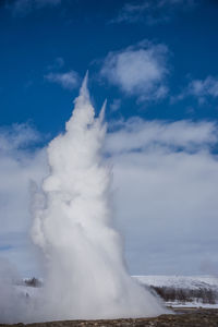 Scenic view of clouds over mountain