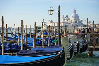 Gondolas moored in canal