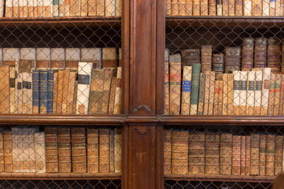 Ancient books in the shelve of university library 