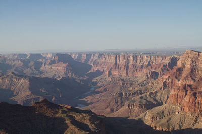 Scenic view of rocky mountains against clear sky at grand canyon national park