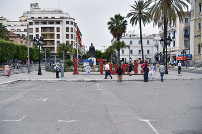 Group of people in front of building