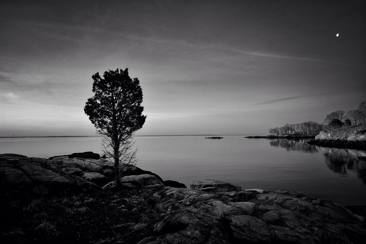 water, tranquil scene, sky, tranquility, scenics, sea, beauty in nature, rock - object, nature, silhouette, horizon over water, tree, cloud - sky, idyllic, rock formation, rock, reflection, cloud, shore, dusk