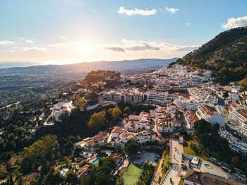 Aerial view of townscape against sky