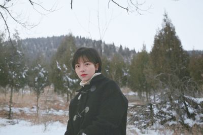 Close-up of girl standing in snow