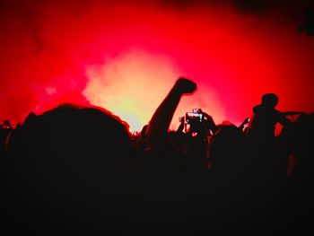 Silhouette people at music concert