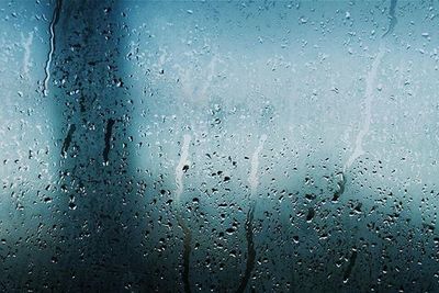 Close-up of water drops on glass