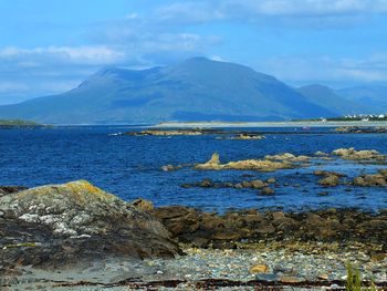 Scenic view of sea against mountains