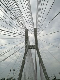 Low angle view of redzin bridge against cloudy sky