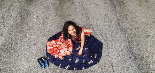 High angle view of woman sitting 