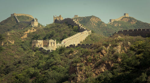 View of castle on mountain against sky