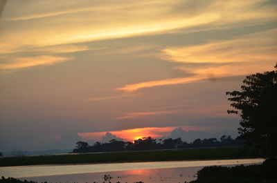 Scenic view of sunset against sky