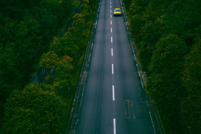 High angle view of car on road amidst trees