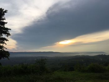 Scenic view of landscape against sky during sunset