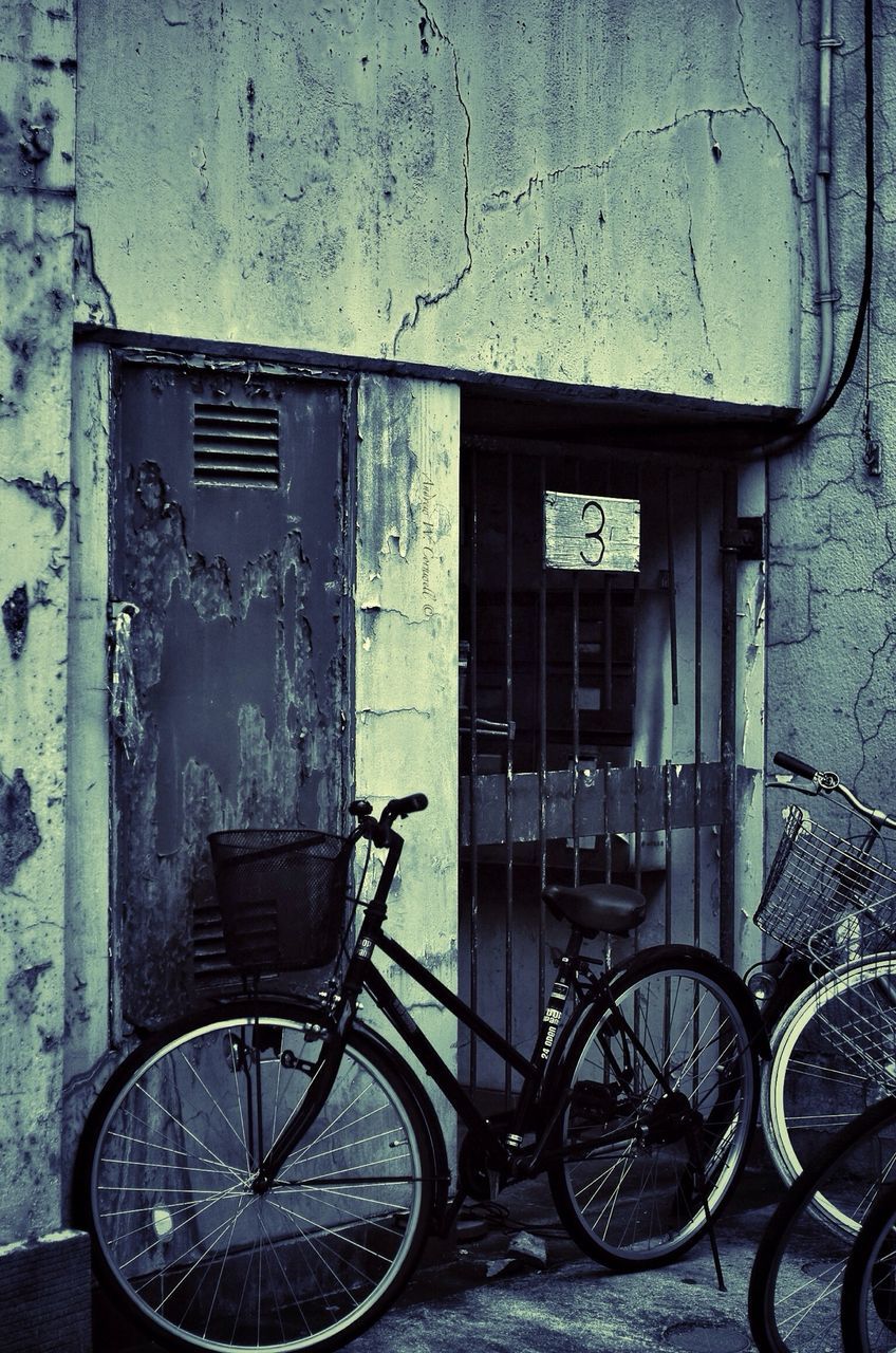 bicycle, transportation, land vehicle, mode of transport, stationary, parked, parking, architecture, building exterior, built structure, window, wall - building feature, street, day, wall, no people, outdoors, building, city, house