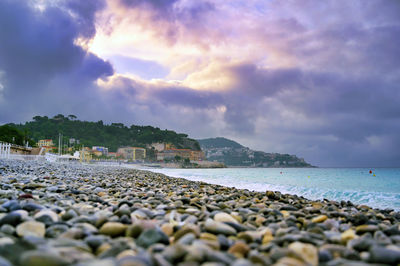 Surface level of beach against sky