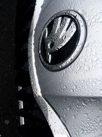 High angle view of raindrops on metal