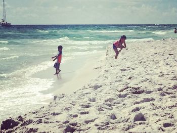 Children playing on beach