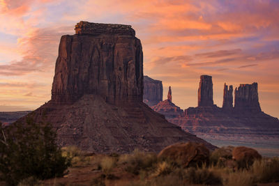 Merrick butte and vibrant sunset over monument valley